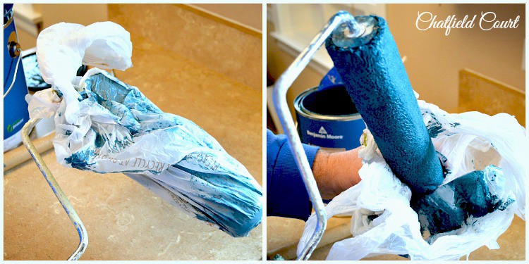used roller covered in blue paint and secured in plastic grocery bag