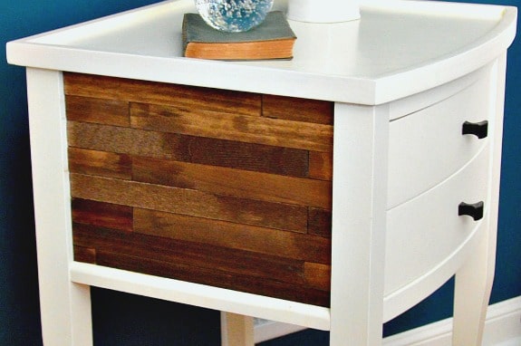 Closeup of a wood and white nightstand 