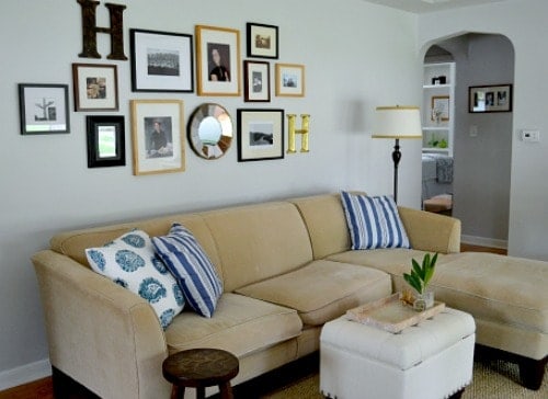 beige sectional sofa in a small living room