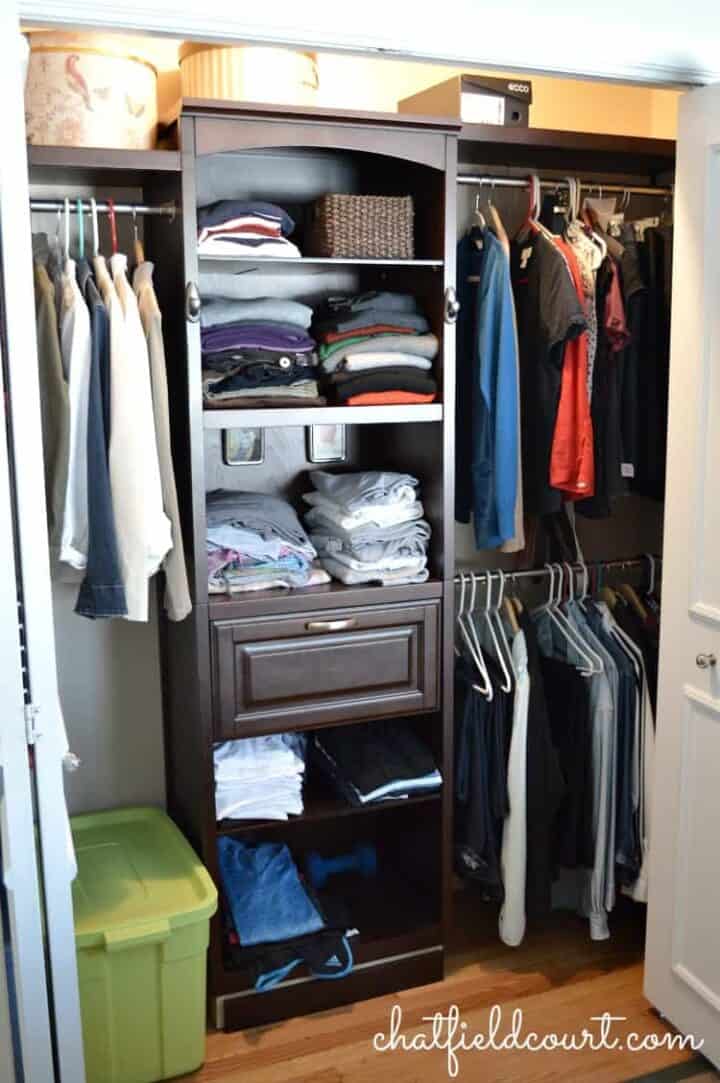 store bought closet system in small master closet