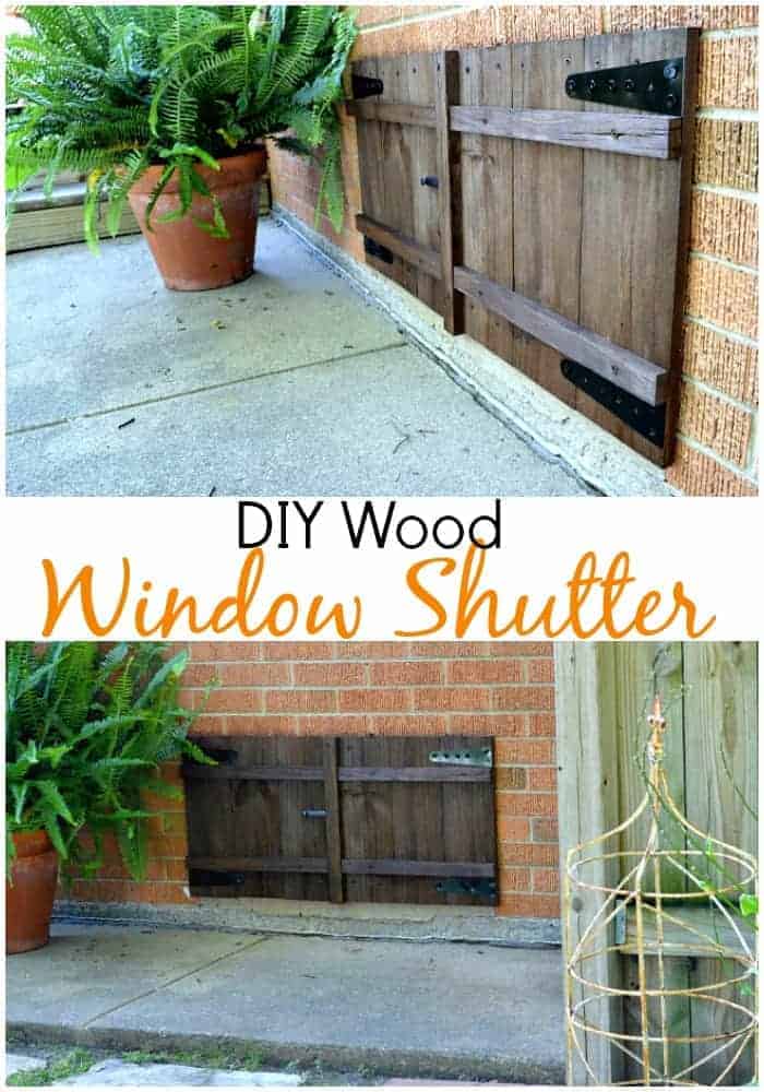 DIY window shutters on a basement window and large graphic