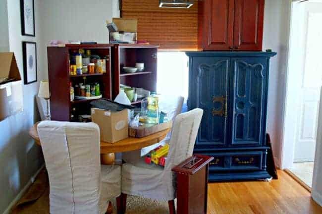 contents of kitchen cabinets on dining table