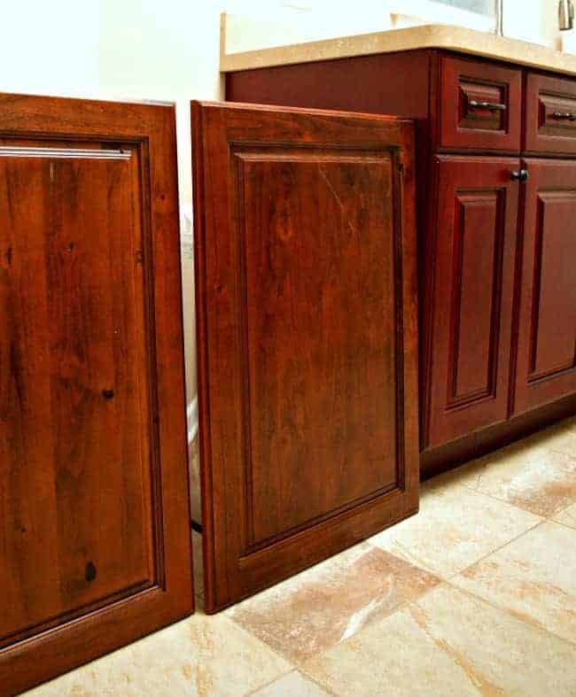 A kitchen storage solution...hidden trash and recycle bins in a custom-made cabinet. | chatfieldcourt.com