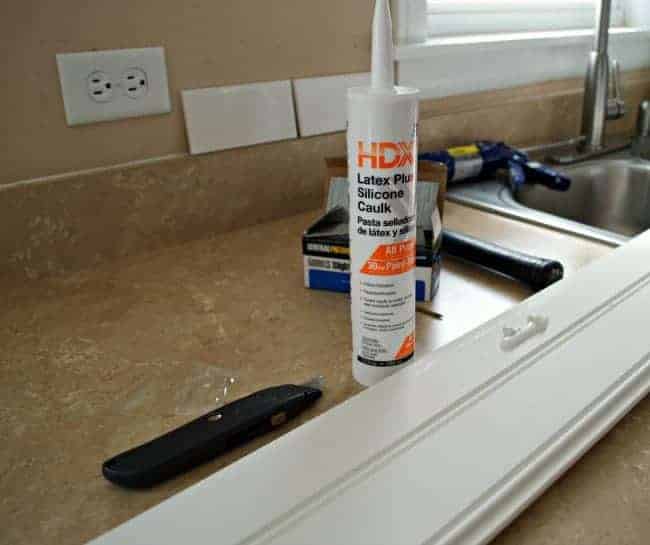 tube of caulk used to install plank ceiling 