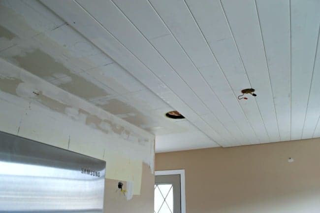 tongue and groove planks installation in kitchen ceiling