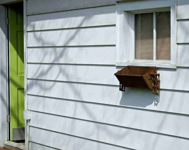DIY Window Planter Box hanging on garage window