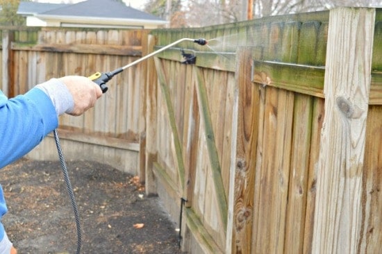Cleaning mold off of a fence