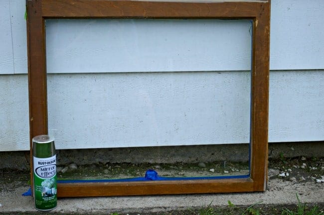 old wood window and can of mirror effect spray paint