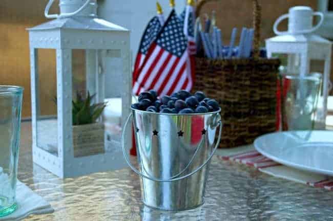 Tin bucket of blueberries