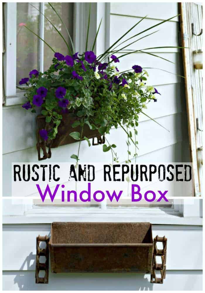 DIY Window Planter Box hanging on garage window with petunias and trailing vines