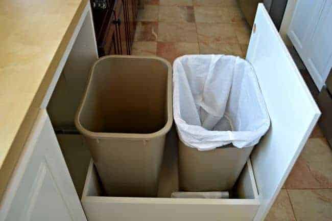 trash can and recycle can in pull out trash cabinet