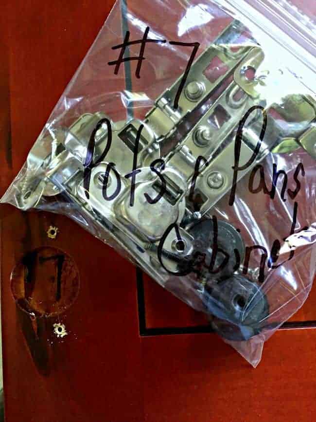 kitchen cabinet hardware in numbered ziplock baggie