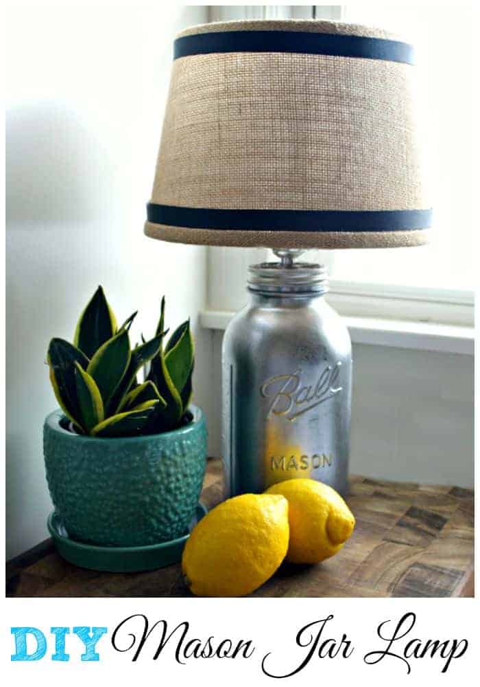 DIY Mason Jar Lamp on cutting board with potted plant and lemons