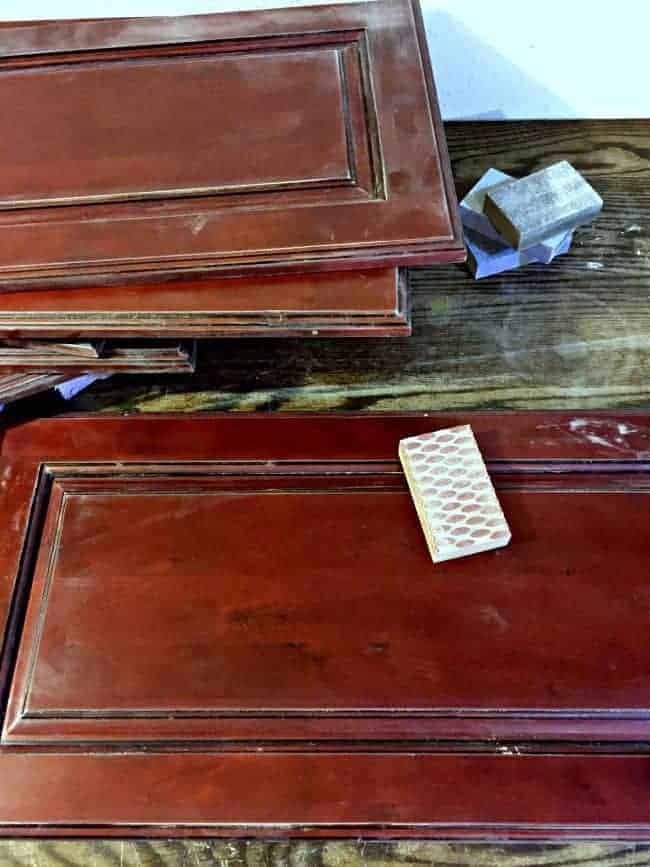 sanding cherry cabinet doors with sanding block