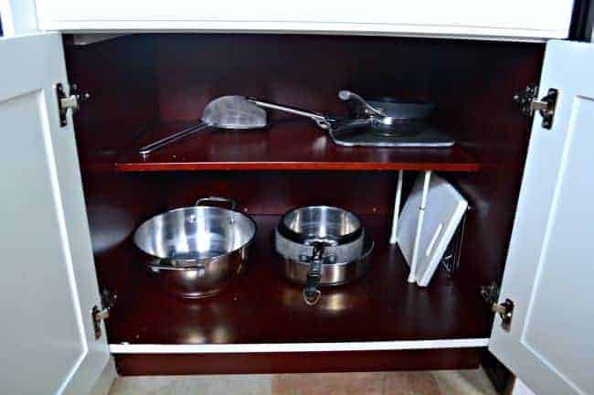 Kitchen pots in cabinet