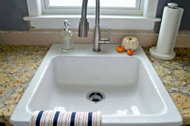 Getting rid of the stainless steel sink and installing a beautiful white farmhouse sink in our new kitchen. | www.chatfieldcourt.com