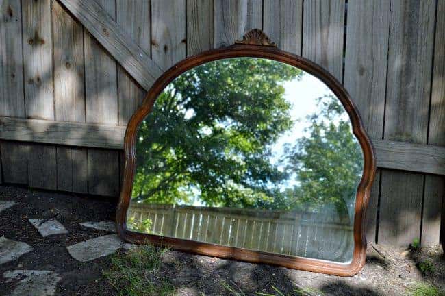 thrifted wood mirror that will get a spray paint makeover