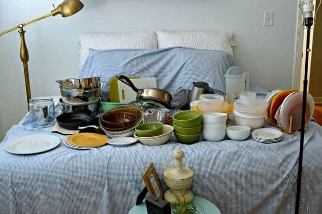 Kitchen dishes on bed