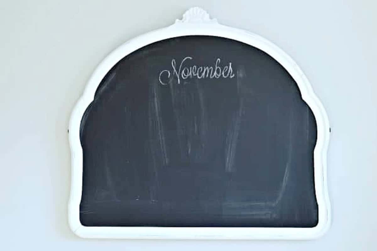 chalkboard art 8 November written on top of DIY chalkboard