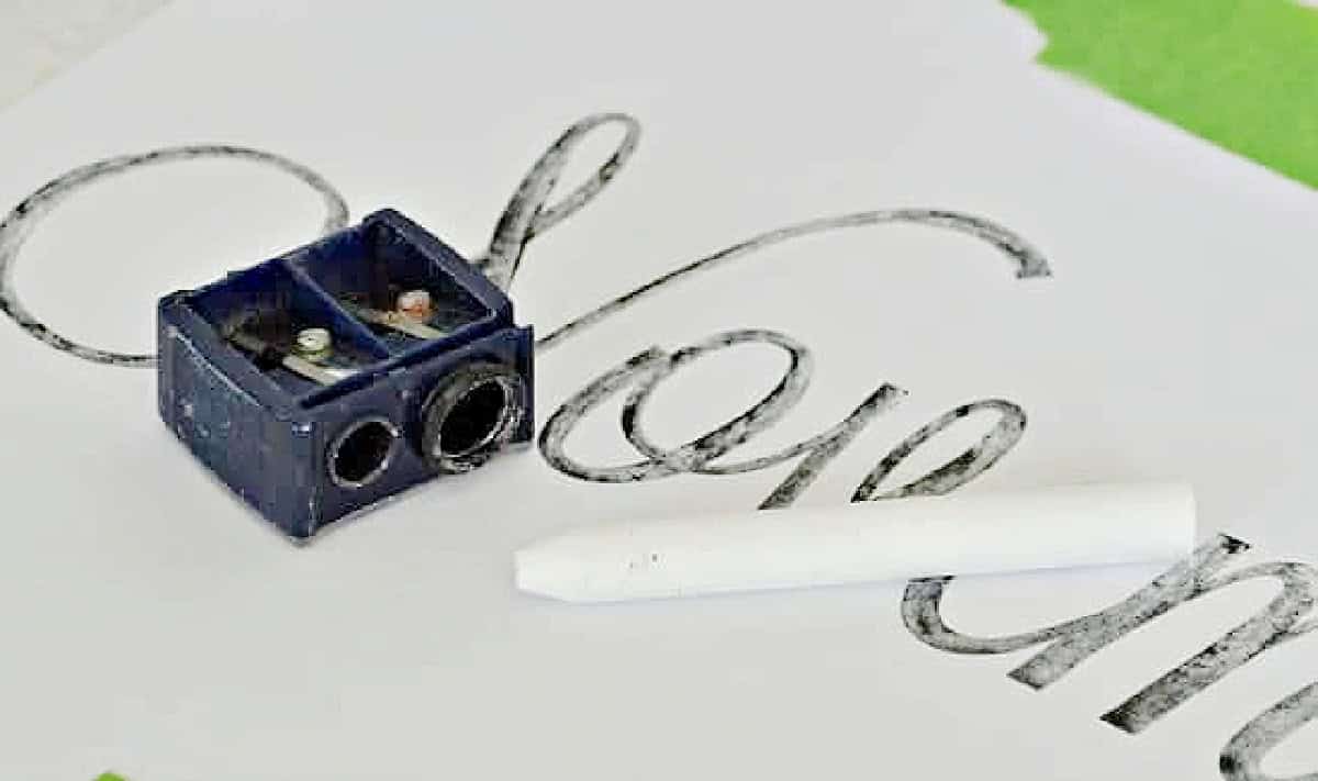 Easy chalkboard calendar pencil sharpener and chalk | www.chatfieldcourt.com pencil sharpener and chalk sitting on piece of paper
