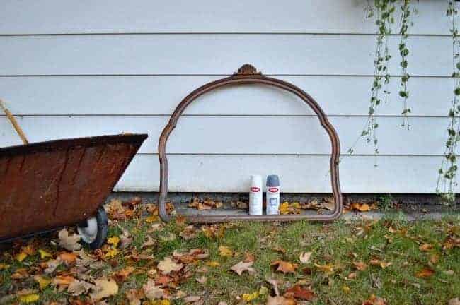 Vintage mirror frame and two cans of spray paint