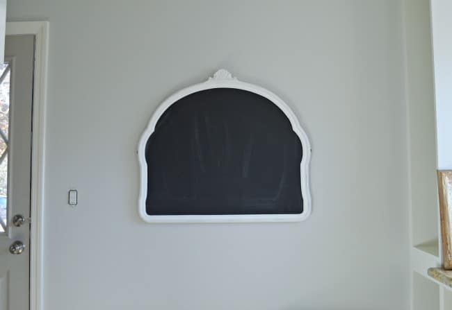 How to Turn a Mirror into a Chalkboard shot kitchen chalkboard hanging on a gray painted kitchen wall