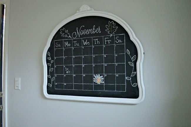 How to Turn a Mirror into a Chalkboard image Vintage mirror turned into a kitchen chalkboard with a calendar