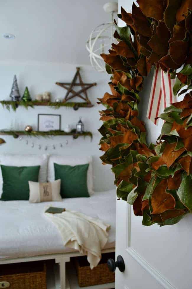 Christmas in the guest bedroom using green velvet, fresh greens and a magnolia wreath | www.chatfieldcourt.com