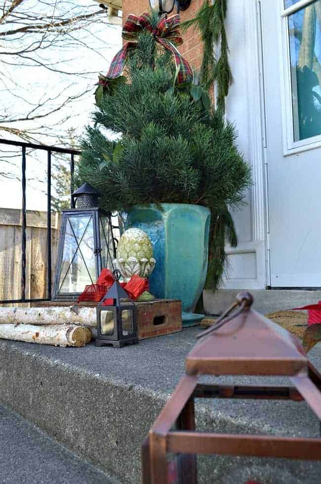 Christmas on our small front porch, which is decorated with a live mini Christmas tree | www.chatfieldcourt.com