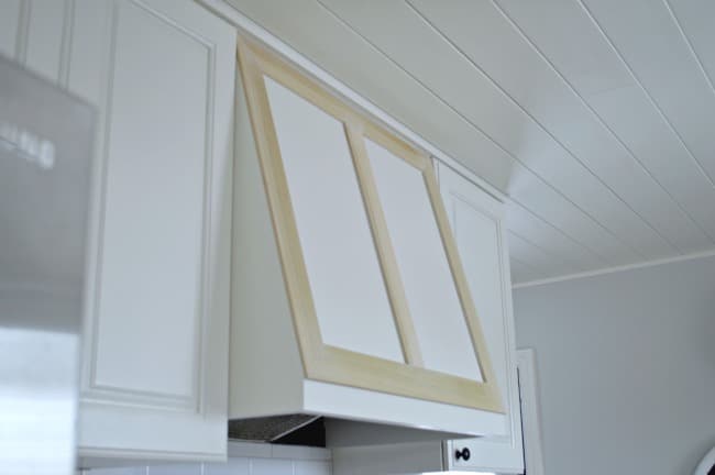 unpainted wood molding on DIY custom range hood