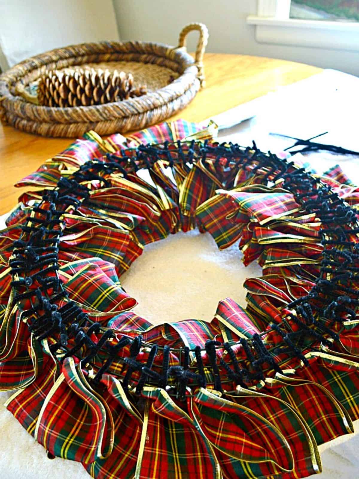 back of DIY ribbon wreath with pipe cleaners