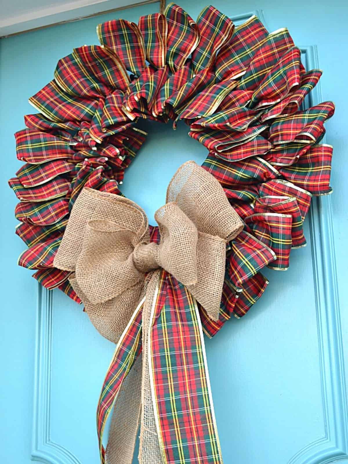ribbon wreath hanging on front door