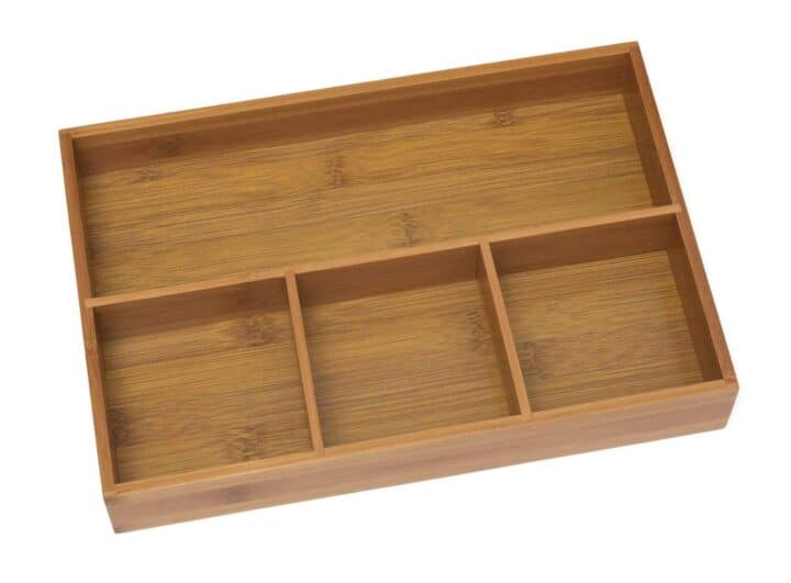 A bamboo tray used in vanity drawers helps with bathroom organization |