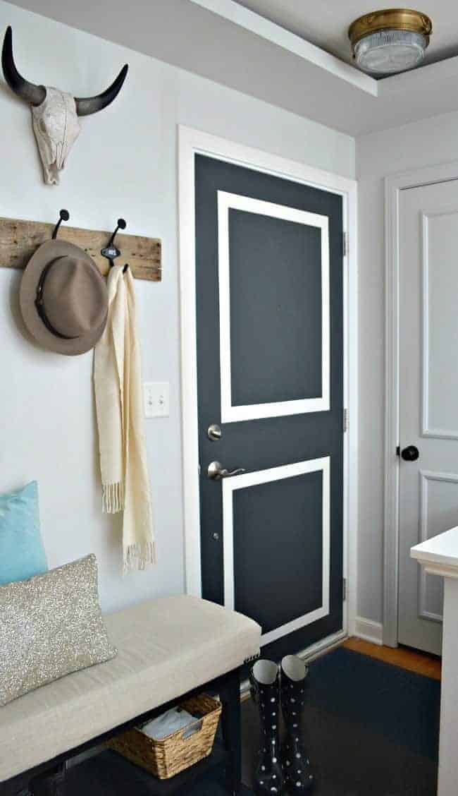 small entryway with gray door