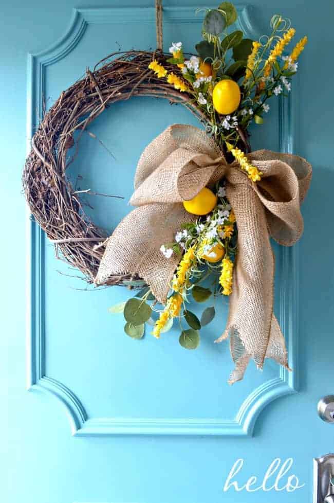 lemon wreath on front door with burlap bow