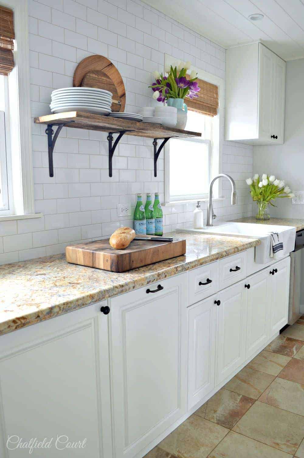 Open shelving in a newly remodeled galley kitchen. www.chatfieldcourt.com