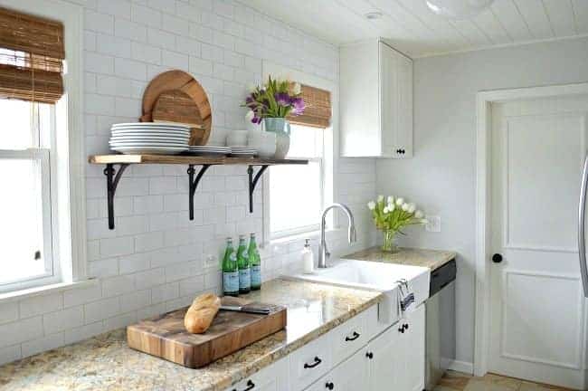 Benjamin Moore Gray Owl used in ta galley kitchen with white cabinets