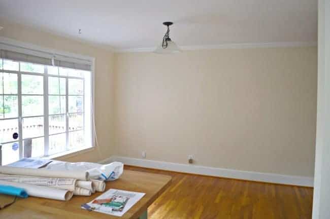 A diningroom with a large window