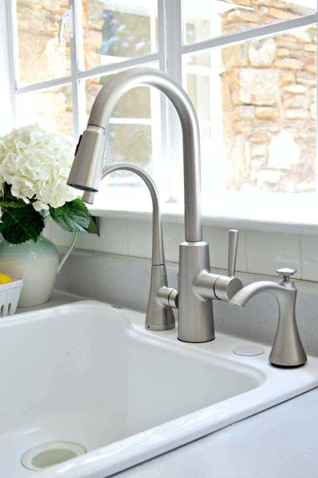 Installing a new kitchen faucet, soap dispenser and beverage faucet with filter from Moen. A DIY project anyone can tackle. www.chatfieldcourt.com