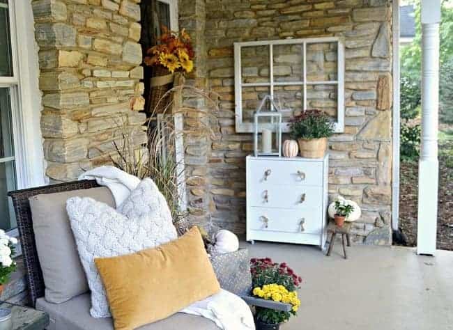 Front porch decorated for a fall home tour. 