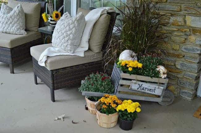 Building this rustic, industrial wheelbarrow for a pretty fall porch. Learn to build your own at THD DIH Workshop near you. www.chatfieldcourt.com