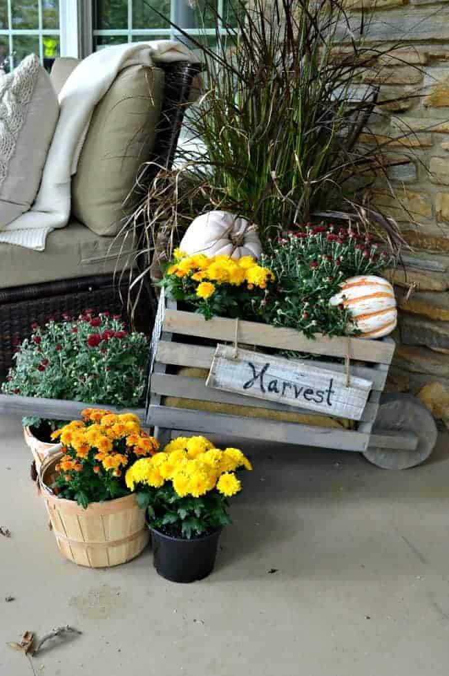 Building this rustic, industrial wheelbarrow, a pretty fall touch to the front porch. Learn to build your own at THD DIH Workshop near you. www.chatfieldcourt.com