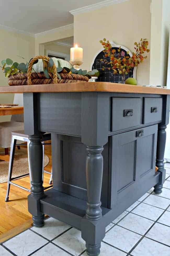 side view of kitchen island with butcher block top