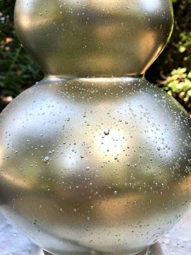 Love this easy DIY lamp makeover using spray paint to give it an aged mercury glass look.