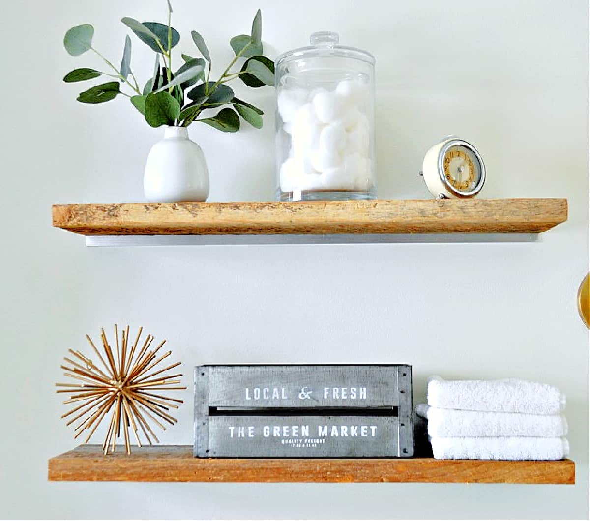 DIY floating  shelves with decor in bathroom