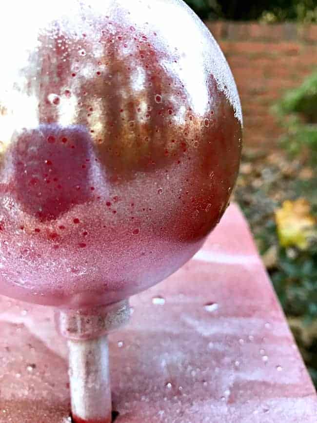 dried mercury glass paint on red glass ornament