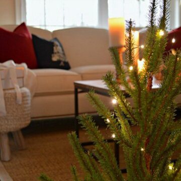 A living room with a christmas tree