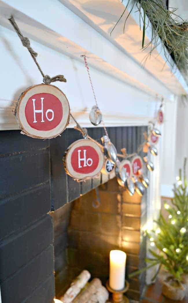 closeup of DIY wood slice banner with the word ho on it