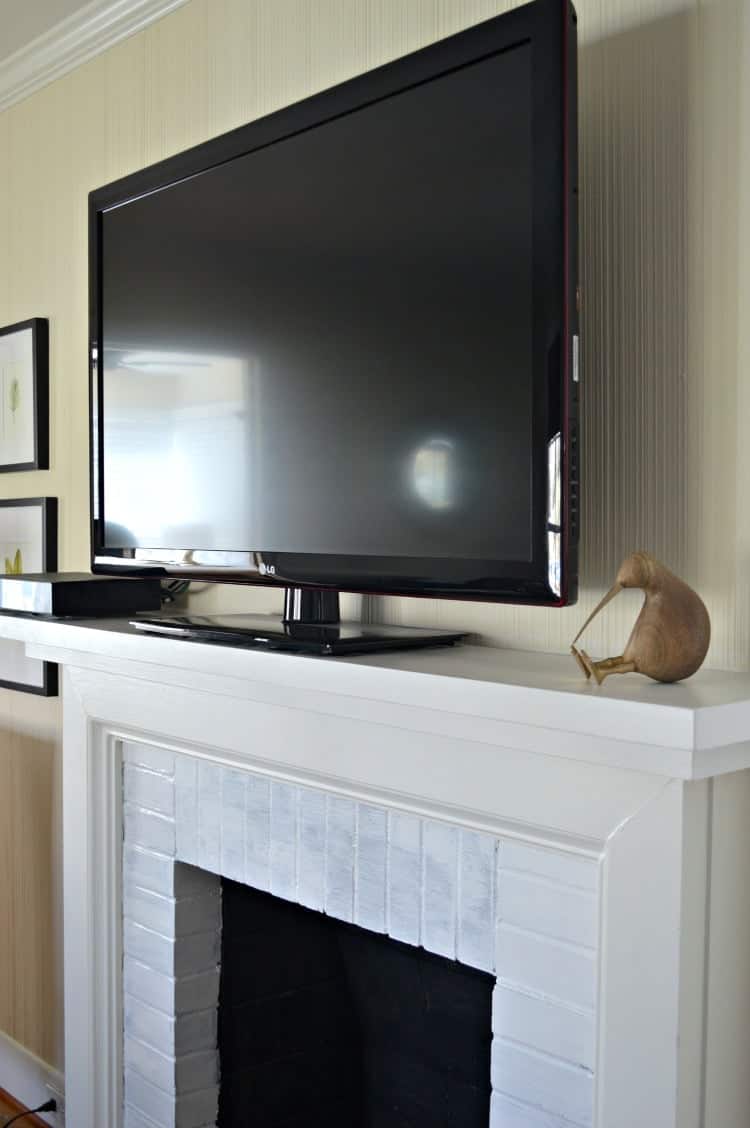 tv on new fireplace mantel