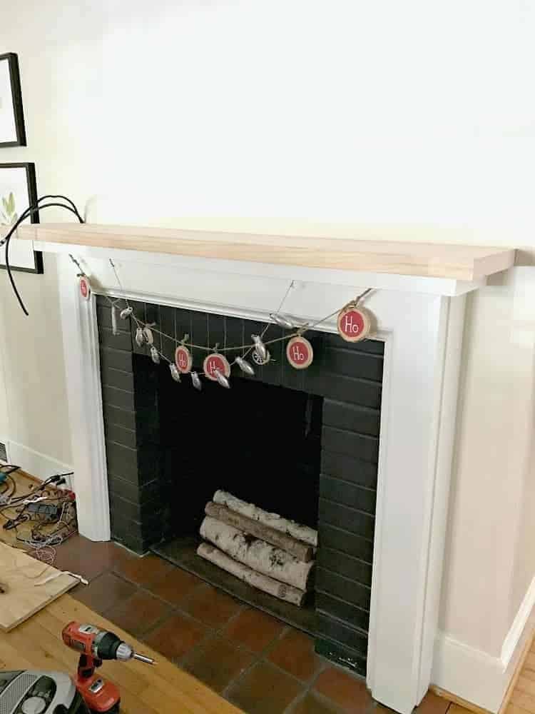 new piece of wood on fireplace mantel 